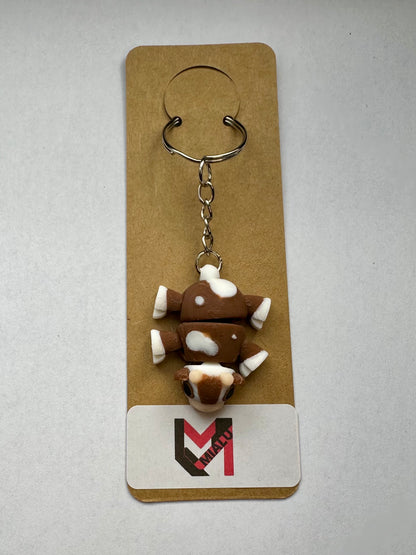 Schlüsselanhänger „Mini-Kuh-Flexi“ braun
